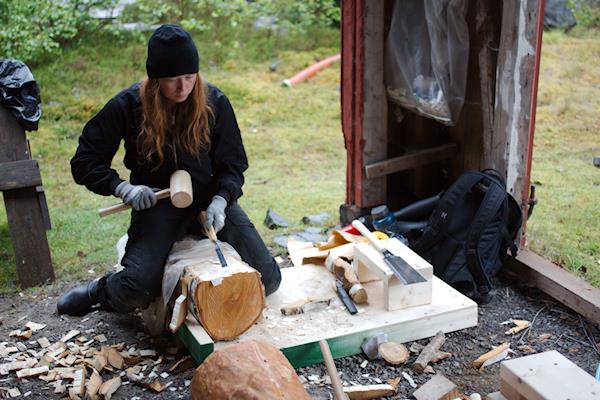 Working on a log during the 2016 Sorkfjord wood sculpture workshop.